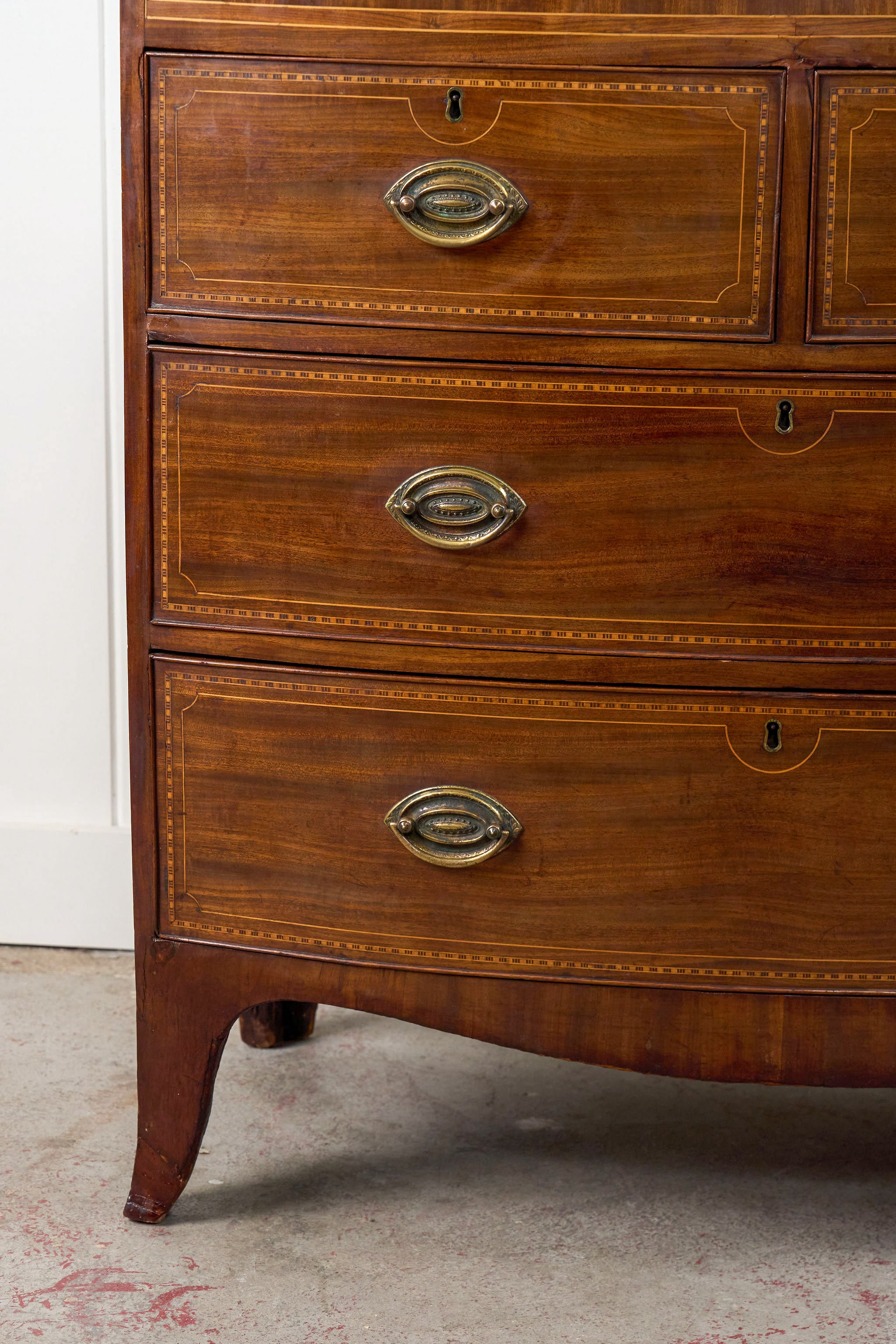 19th Century Mahogany Bowfront Chest with Satinwood Inlay on Splay Feet (c. 1810)