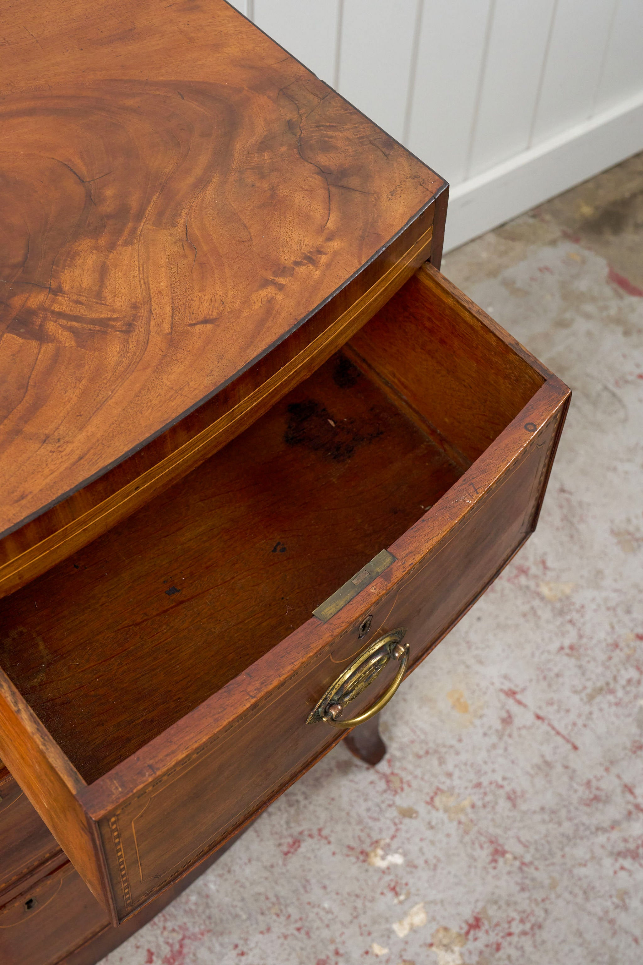 19th Century Mahogany Bowfront Chest with Satinwood Inlay on Splay Feet (c. 1810)