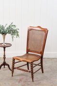 Load image into Gallery viewer, Antique Petite Walnut Accent Chair with Hand-tied Cane Seat + Back with Bobbin Legs
