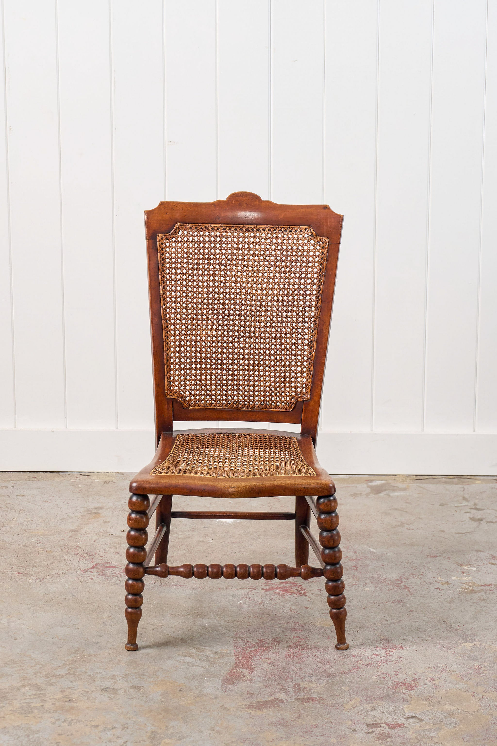 Antique Petite Walnut Accent Chair with Hand-tied Cane Seat + Back with Bobbin Legs