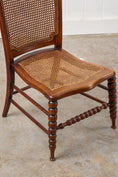 Load image into Gallery viewer, Antique Petite Walnut Accent Chair with Hand-tied Cane Seat + Back with Bobbin Legs
