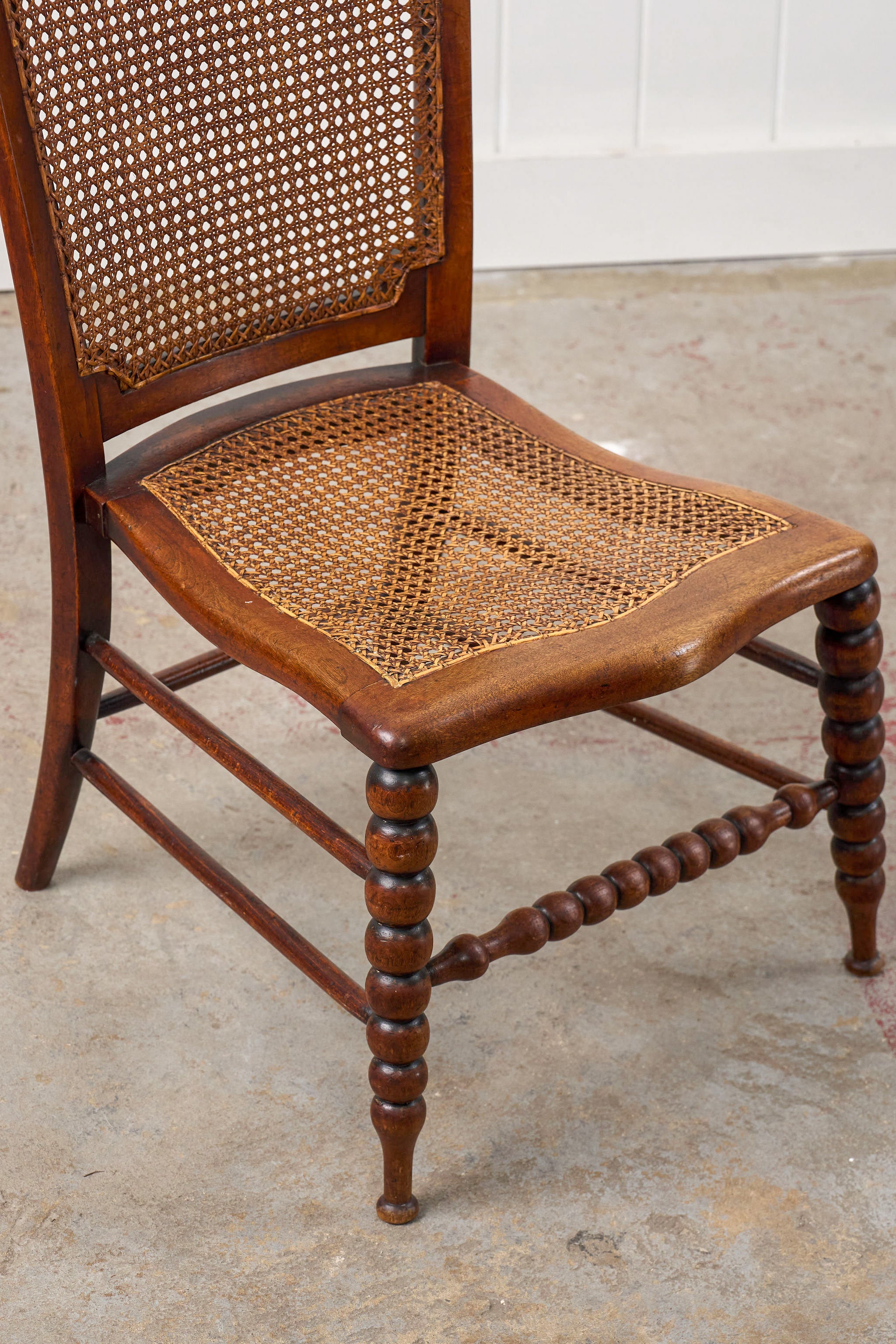 Antique Petite Walnut Accent Chair with Hand-tied Cane Seat + Back with Bobbin Legs