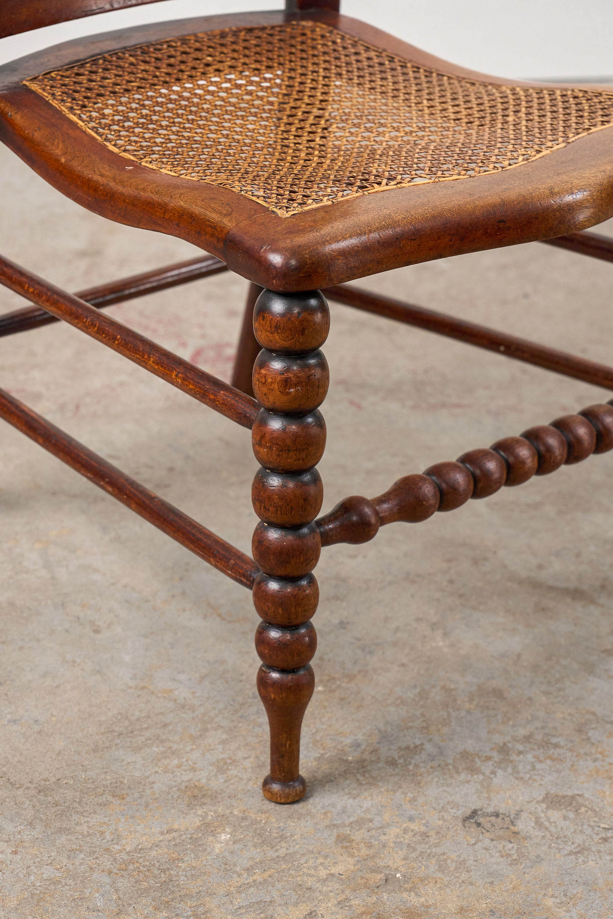 Antique Petite Walnut Accent Chair with Hand-tied Cane Seat + Back with Bobbin Legs