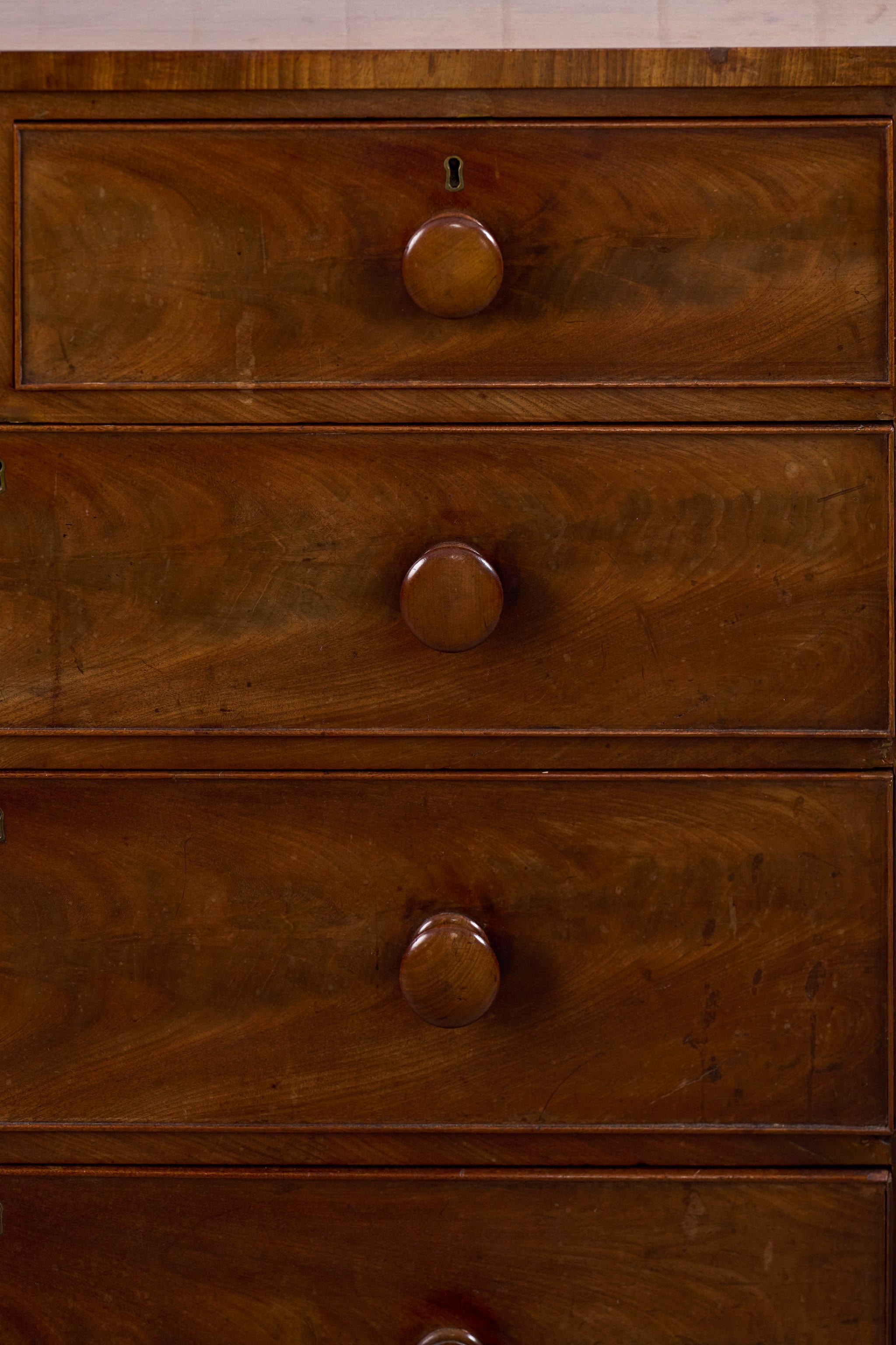 Early 19th Century Flame Mahogany with Original Knobs (c. 1825)