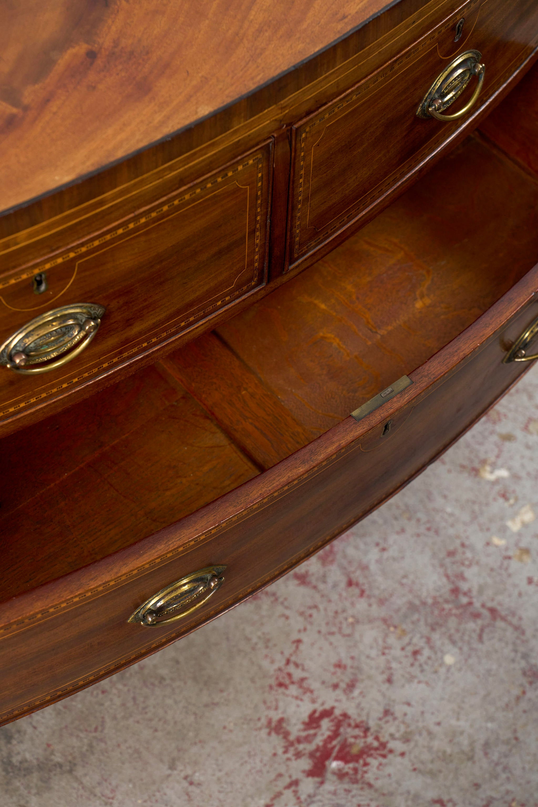 19th Century Mahogany Bowfront Chest with Satinwood Inlay on Splay Feet (c. 1810)