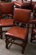 Load image into Gallery viewer, SET of 10 | English Cromwellian Style Oak Bobbin Stretcher Base Dining Chairs with Leather Upholstery (c. 1920)
