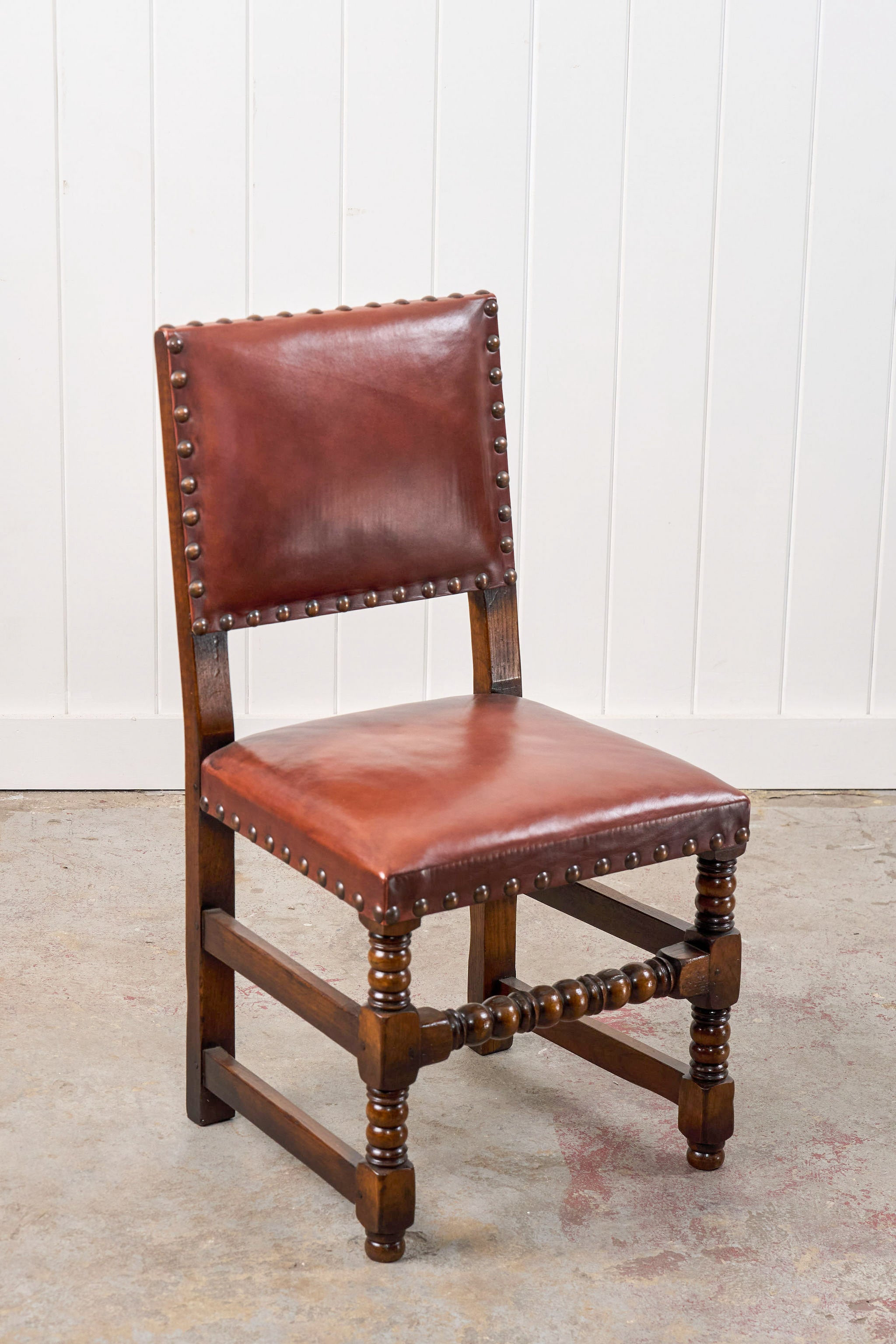 SET of 10 | English Cromwellian Style Oak Bobbin Stretcher Base Dining Chairs with Leather Upholstery (c. 1920)