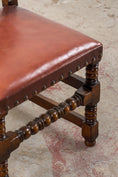 Load image into Gallery viewer, SET of 10 | English Cromwellian Style Oak Bobbin Stretcher Base Dining Chairs with Leather Upholstery (c. 1920)
