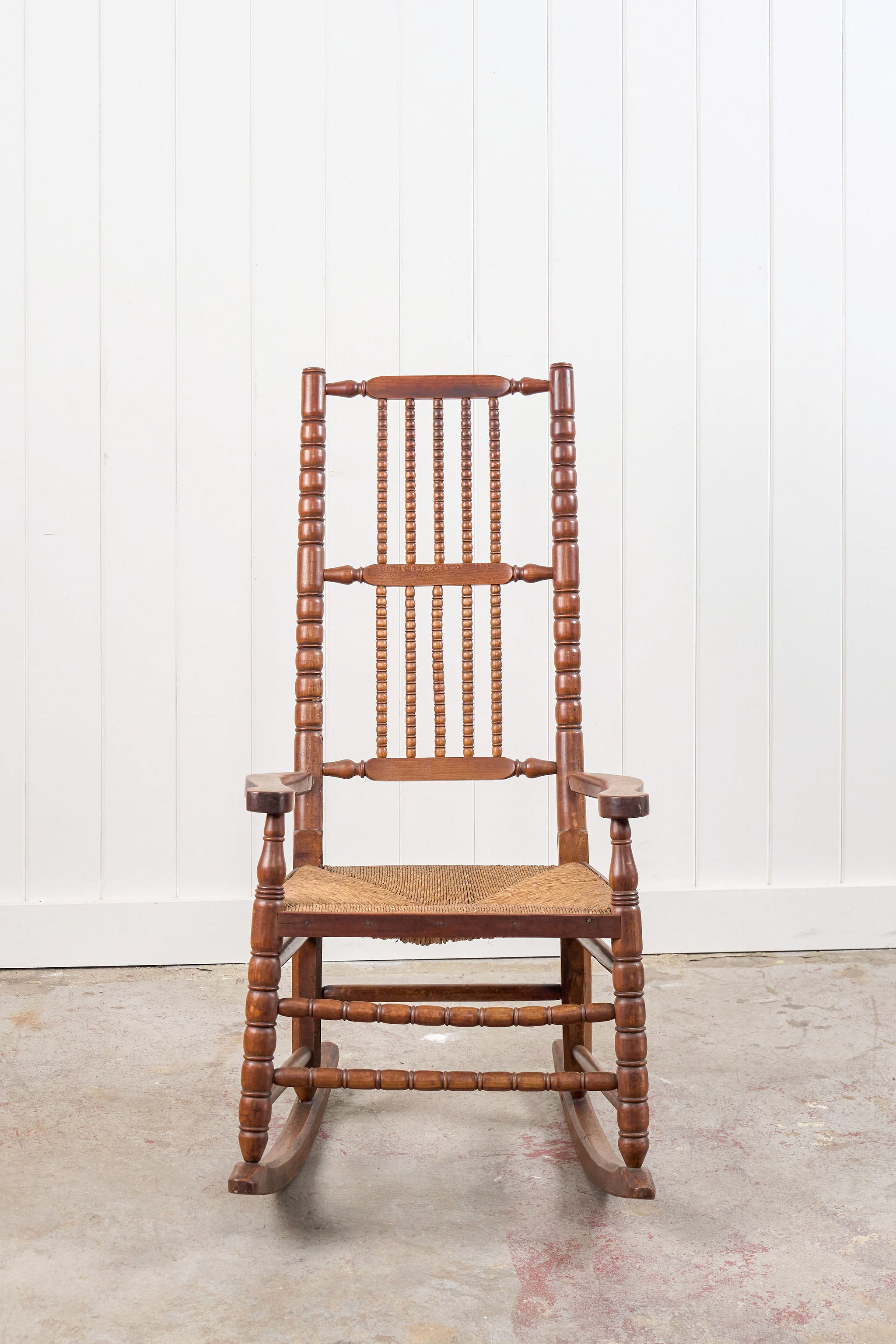Antique English Bobbin Rocking Chair with Rush Seat