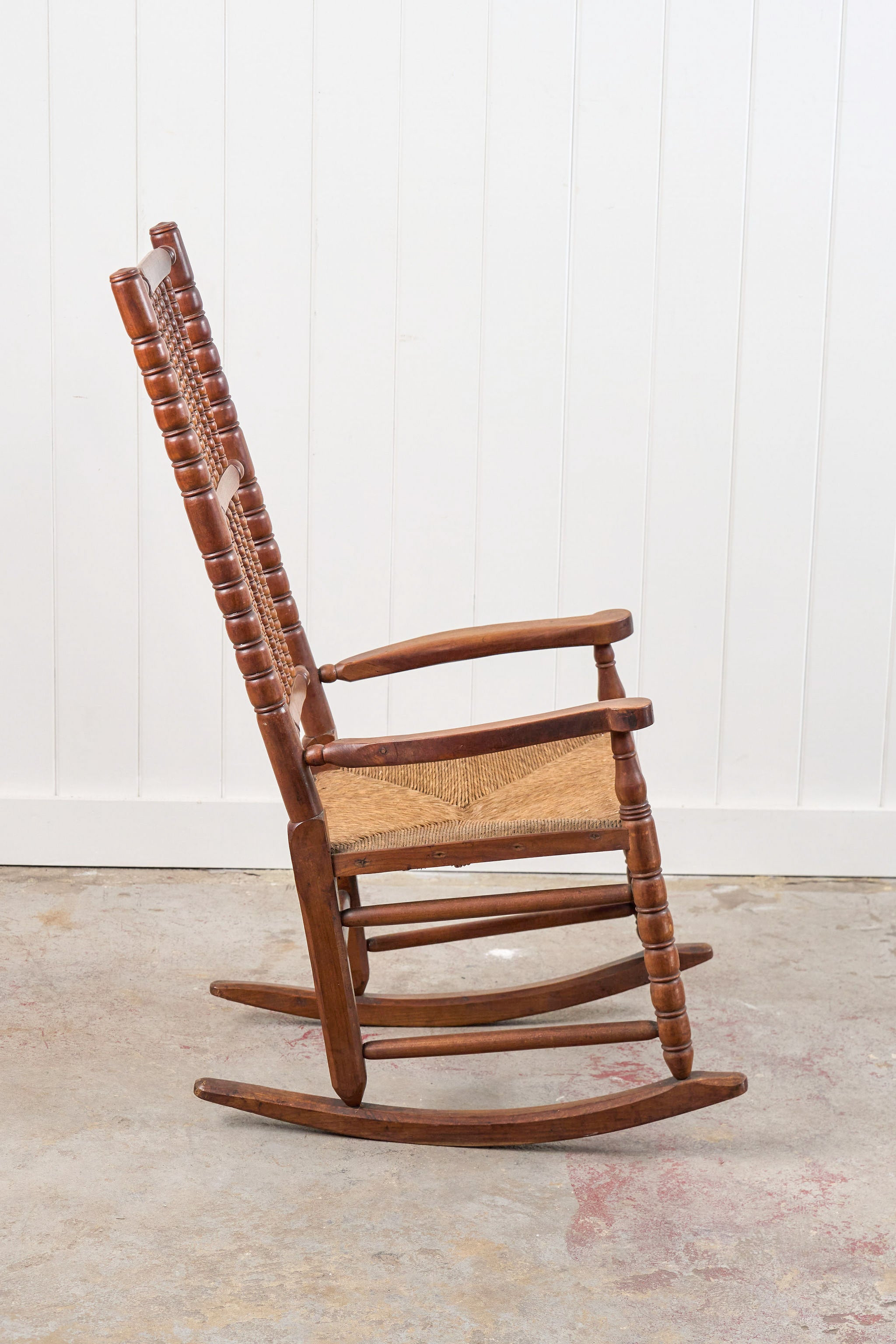 Antique English Bobbin Rocking Chair with Rush Seat