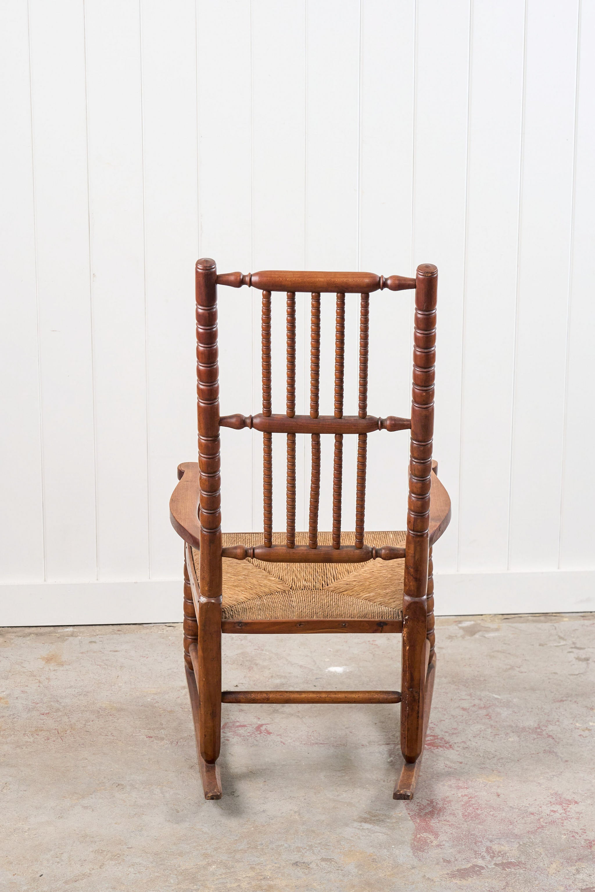 Antique English Bobbin Rocking Chair with Rush Seat
